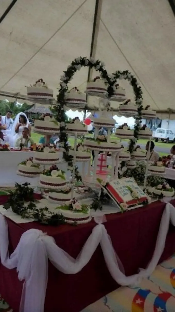 An elegant arrangement of several wedding cakes.