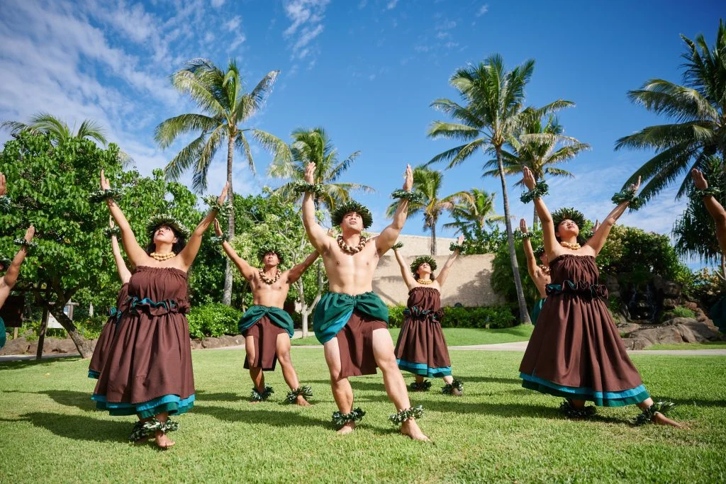 Traditionally-dressed dancers performing a hula kahiko at the Polynesian Cultural Center.