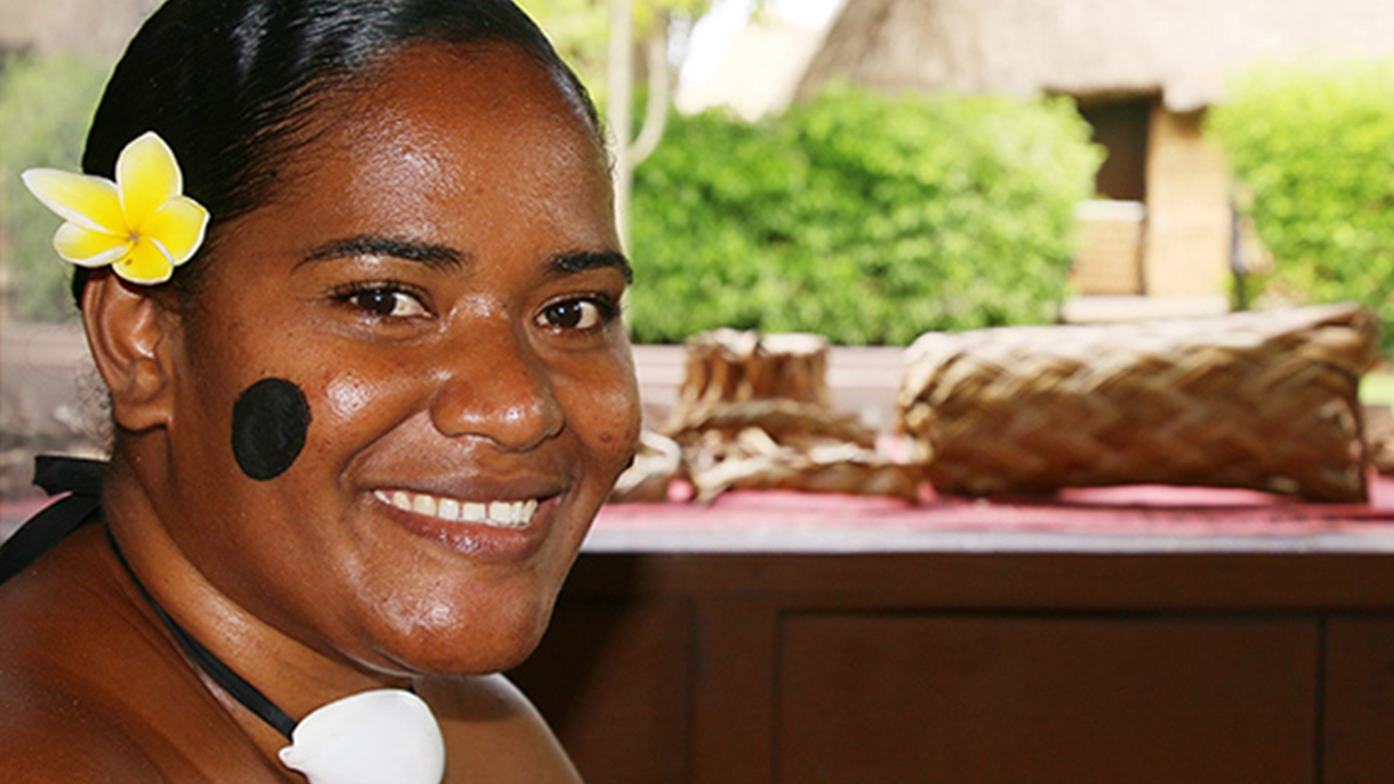 Nunia Yadraca, a BYU&ndash;Hawaii freshman from Taveuni, Fiji, learned to make Fijian body oil back home from her mother and grandmother. Photo by Mike Foley