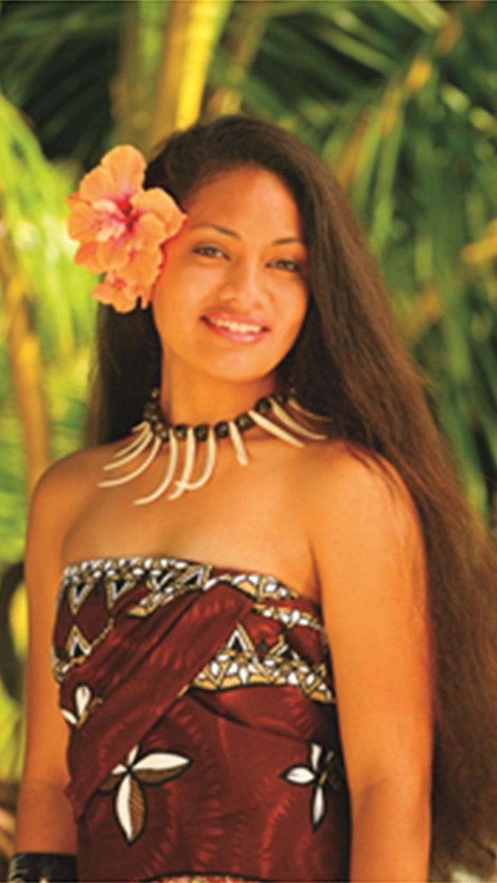 Youthful Polynesia woman wearing traditional attire