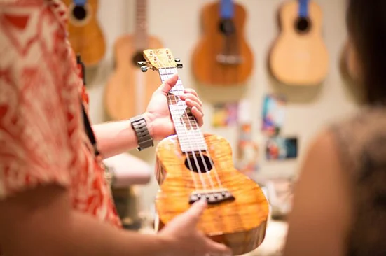 Showcasing koa ukulele.