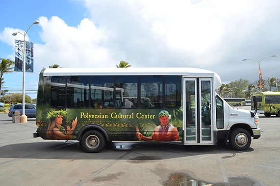 Bus for the Polynesian Cultural Center at the south parking lot.